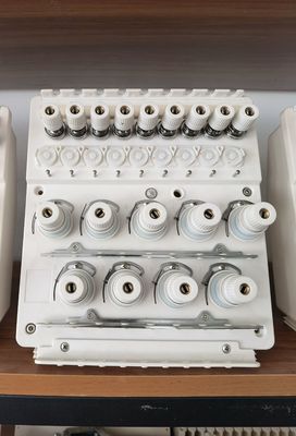 Accessori per macchine per ricami rettangolari / rotonde Base di tensione della testa
